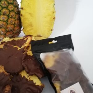 Piña deshidratada cubierta de chocolate de leche x 100g